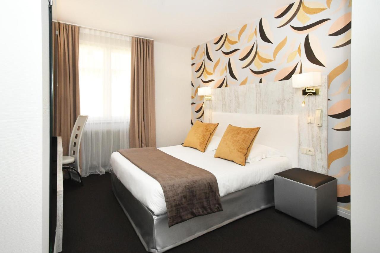 Logis Hotel Du Centre - Halte Ideale En Cyclotourisme Avec Garage A Velos Clos โมลไชม์ ภายนอก รูปภาพ