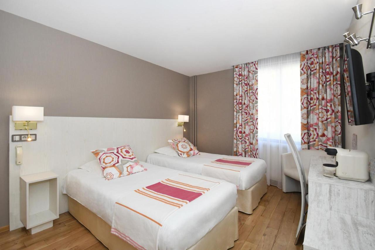 Logis Hotel Du Centre - Halte Ideale En Cyclotourisme Avec Garage A Velos Clos โมลไชม์ ภายนอก รูปภาพ
